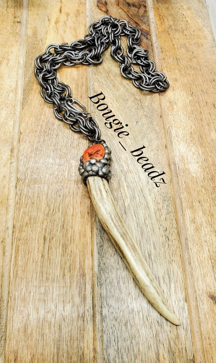 Orange coral soldered horn necklace